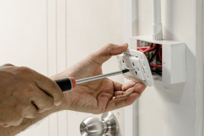 Electrician Installing Outlet